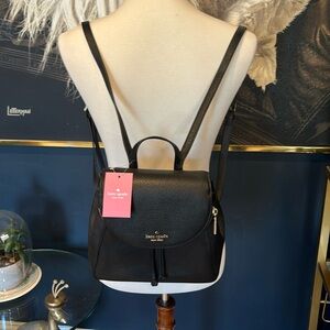 Kate Spade black leather (?) medium flip backpack nwt
